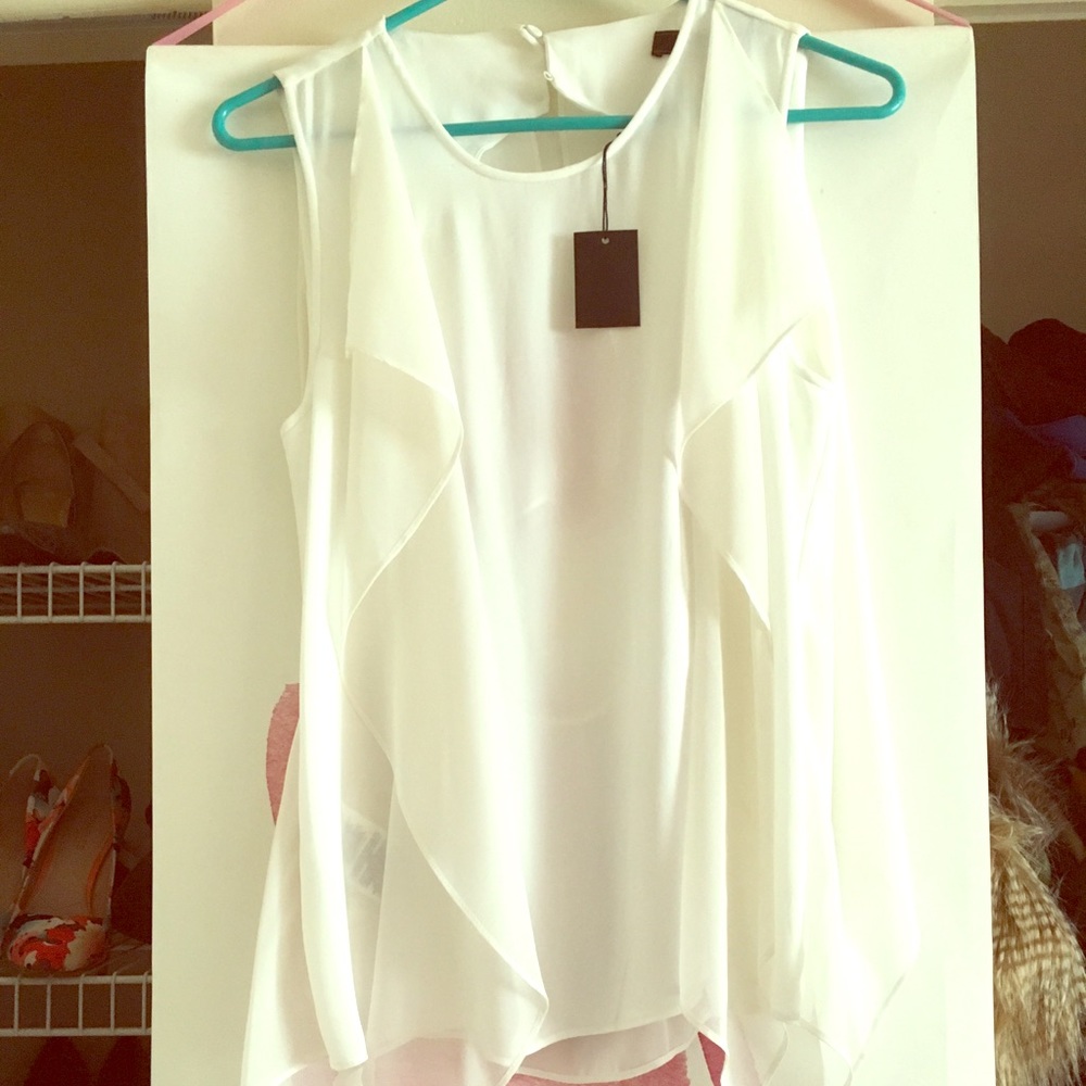 Blouse open in back.